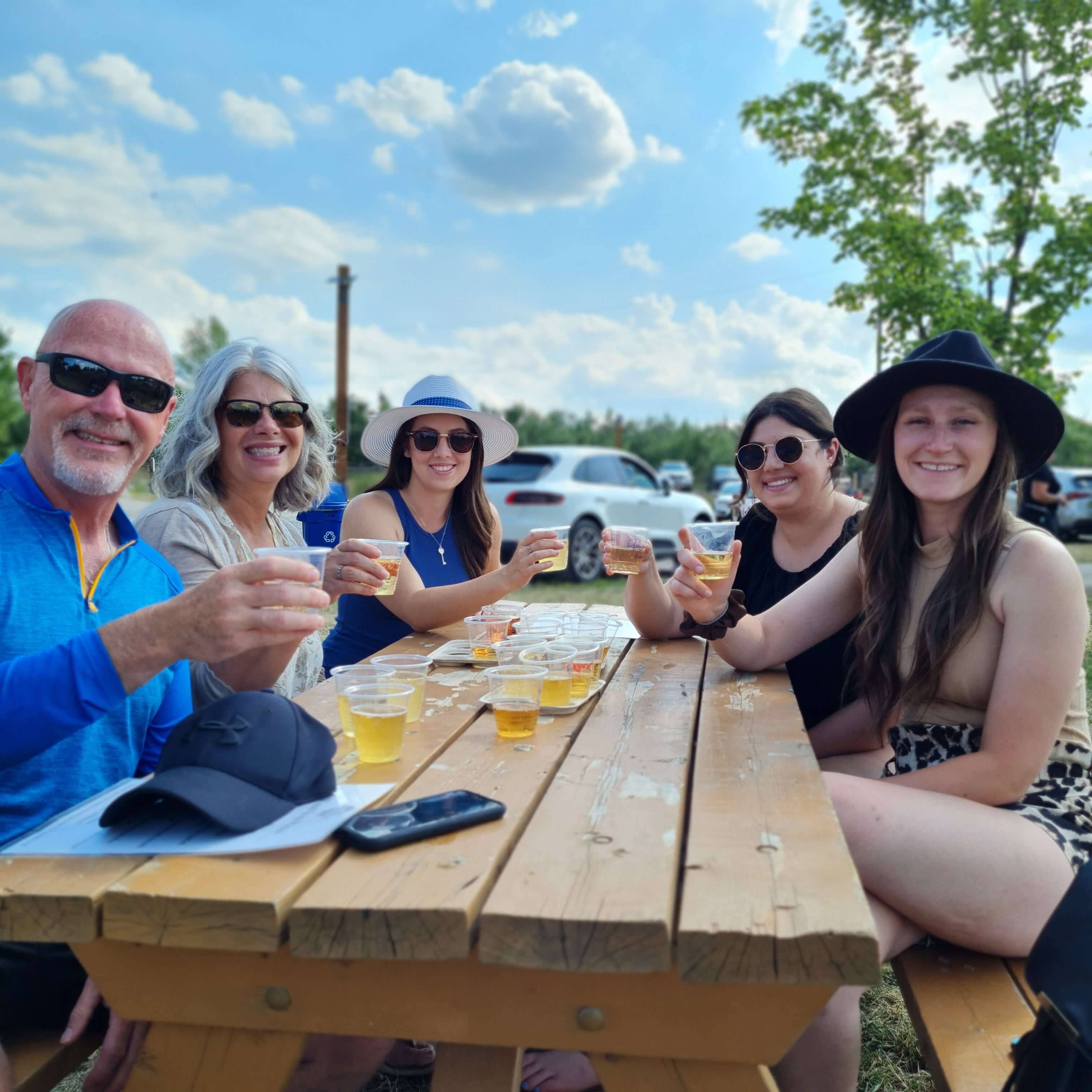 people at Spirit Tree Cider Gardens enjoying a Hamdcrafted with Love Artisan Market